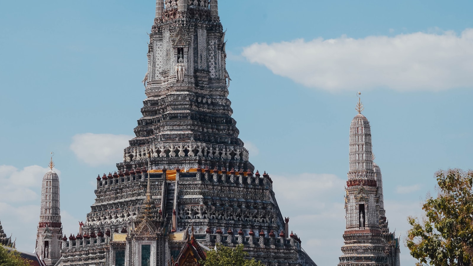 Wat Arun temple beside the Chao Phraya river in Bangkok
